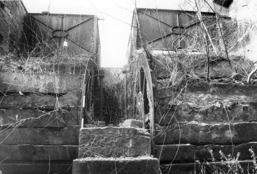 Photograph of the Olive Wheel double water wheels in 1989.